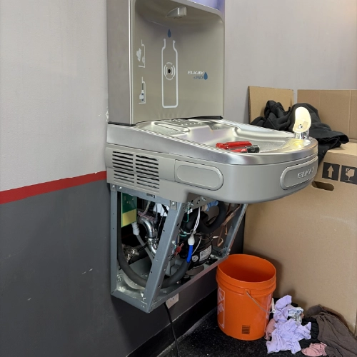 Plumber responding to a recurring commercial plumbing issue before it becomes a bigger problem – Professional Plumbing Group Toronto